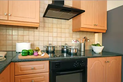 a kitchen with a stove and a counter top at Villa Posidonia - 200m from Sandy Beach in Ayia Napa