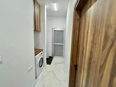 a laundry room with a washer and dryer at Sol e Mar Villa 2 in Paralimni