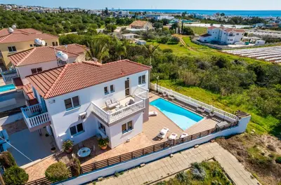 an aerial view of a house with a swimming pool at Spacious Villa with Private Pool & Breathtaking Panoramic Ayia Napa views in Ayia Napa