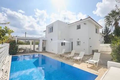 a villa with a swimming pool and a house at Serifos Villa 7 - 100 meters from Malama Beach in Protaras