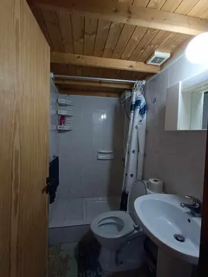 a bathroom with a toilet and a sink at Galata's Bridge Hotel in Galata