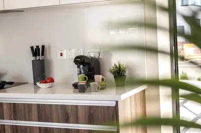 a kitchen counter with a coffee maker on it at Protaras Hestia Seaside Villa B6 in Protaras