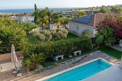 an aerial view of a house with a swimming pool at ROSE VILLA - 3 BED POOL in Episkopi Lemesou