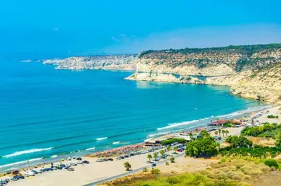 an aerial view of a beach with a crowd of people at ROSE VILLA - 3 BED POOL in Episkopi Lemesou