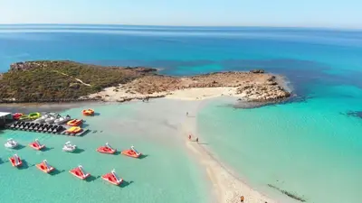 an aerial view of a beach with boats in the water at Estelle Suite in Ayia Napa