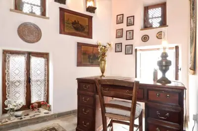 a room with a desk with a vase on it at Historical House in the Old City of Nicosia in Nicosia