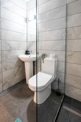 a bathroom with a toilet and a sink at COZY Apartment In Kapparis #2 in Paralimni