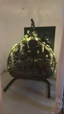 a bench with flowers on it in a room at Pirella House in Limassol