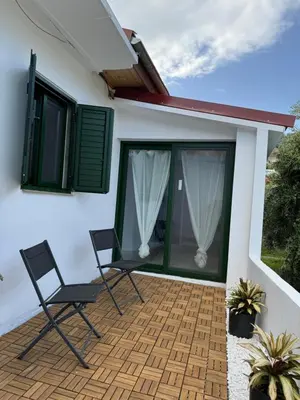two chairs on the patio of a house at Pirella House in Limassol