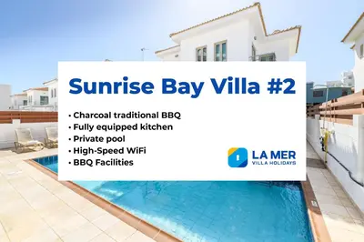 a sign for a villa with a swimming pool at Sunrise Bay Villa #2 in Protaras