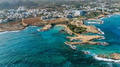 an aerial view of a beach near the ocean at Green Bay Villa #17 in Protaras