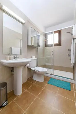 a bathroom with a sink and a toilet and a shower at Villa Greco Mare #40 in Protaras