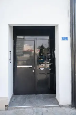 an entrance to a building with a large door at Quattro City Center Ap 501B in Larnaka