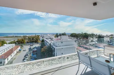 a balcony with a view of a city at Gaia Seaview Apartment 2 in Larnaka