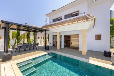 a villa with a swimming pool and a house at SunnyVillas-3BR New Modern Villa-Private Pool-HVN in Paralimni