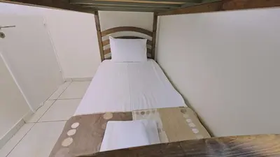 a pair of bunk beds in a small room at Nissi Golden Sands Privileges Apt in Ayia Napa