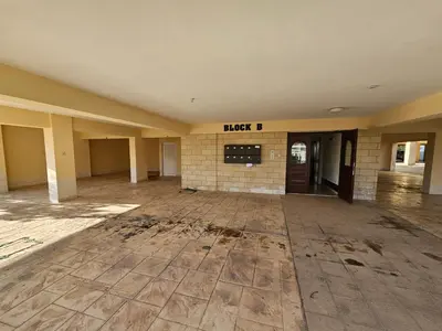 an empty lobby with a sign that reads hope b at STEFARIS sea & mountain view in Larnaka