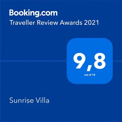 a screenshot of a phone with the sunless villa at Sunrise Villa in Pervolia