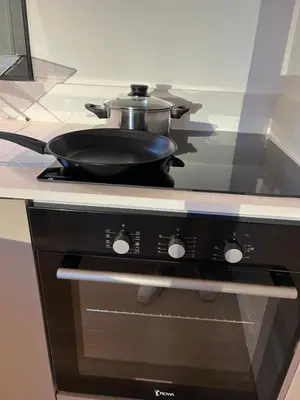 a frying pan sitting on top of a stove at Modern 2bed in the centre in Nicosia