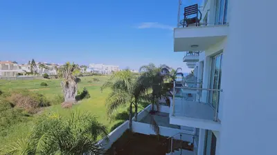 a balcony of a building with a view of a field at STAY White Coral Studio in Protaras