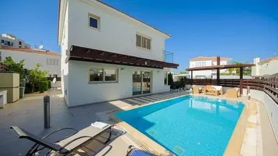 a swimming pool in the backyard of a house at Pernera Holiday Villa 015 in Protaras