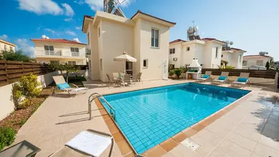 a swimming pool in the backyard of a house at Ayia Napa Holiday Villa 003 in Ayia Napa