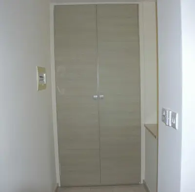 a glass door in the corner of a room at Summer Breeze in Paralimni