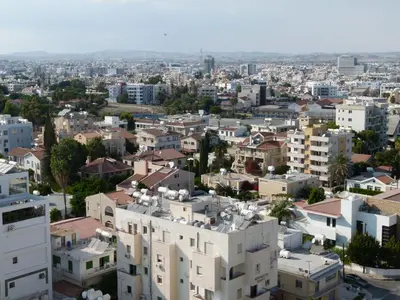an aerial view of a city with buildings at Aphrodite Heights in Larnaka