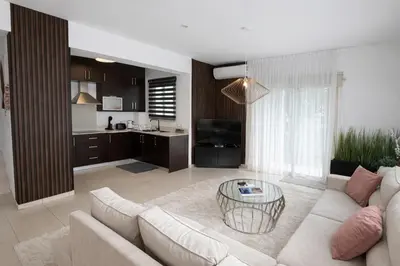 a living room with a couch and a table at Villa Dolce Vita in Protaras