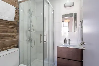 a bathroom with a shower and a sink at Arion 1-Bedroom Apartment in Larnaca in Larnaka