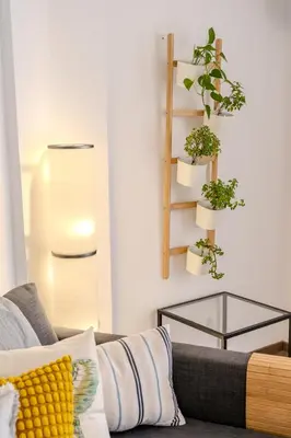 a living room with a couch and a glass table at Finikoudes Seaview Vibe 1 Bdr Flat in Larnaka