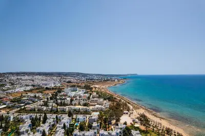 an aerial view of a beach and the ocean at Kritamo Beach Hotel Apartments in Ayia Napa