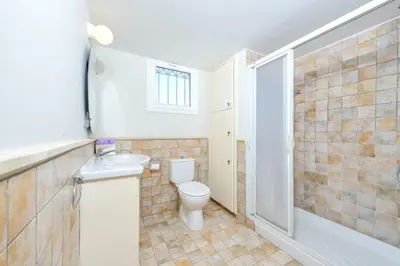 a bathroom with a toilet and a sink and a shower at Villa Marilena in Protaras