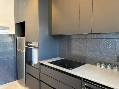 a kitchen with a stove and a refrigerator at Cozy 1 BDR in Nicosia city center - Aiantos By Platform 357 in Strovolos