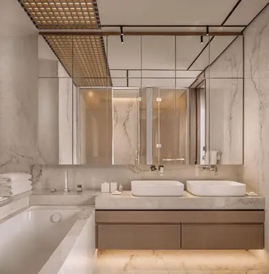 a bathroom with two sinks and a tub at Amathus Residences in Limassol