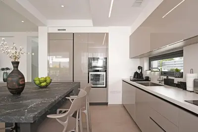 a kitchen with a counter with a vase on it at Levanda Platinum - Sunrise Sea View in Protaras