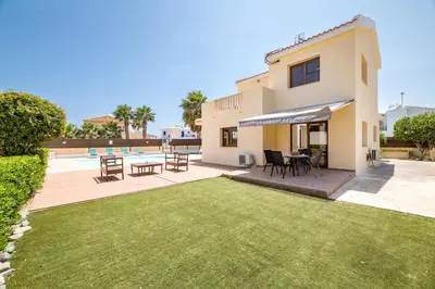 an image of a house with a yard at Villa Sarah in Ayia Napa