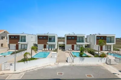an image of an apartment complex with a swimming pool at Serenity Waves Villa 7 in Sophtadhes