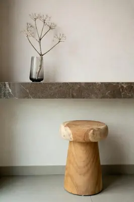 a wooden stool with a vase on a shelf at Amazing Protaras Villa Villa Lubbock 3 Bedrooms Private Outdoor Pool in Protaras