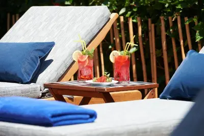 a table with two vases with plants on it at Luxury Protaras Villa Villa Najenda 3 Bedrooms Private Outdoor Pool in Protaras