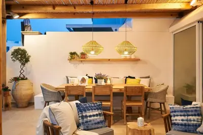 a dining room with a table and chairs at Luxury Protaras Villa Villa Najenda 3 Bedrooms Private Outdoor Pool in Protaras