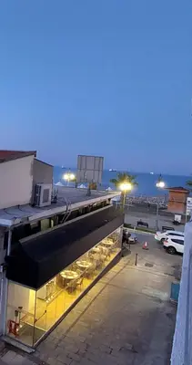 a view of a building with a parking lot at Paradise by the Sea in Larnaka