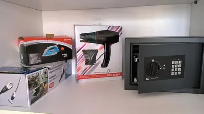 a microwave next to a box and a microwave oven at SPECIAL OFFER -70 Percent OFF - Sleep 5 - Best Location - Free Parking in Ayia Napa