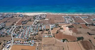 an aerial view of a parking lot next to the ocean at Villa Stephanie Oasis in Ayia Napa