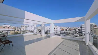 a balcony with a view of a city at STAY Skyline Nest in Larnaka