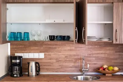 a kitchen with a sink and a counter top at Traditional House Agia Varvara Village in Ayvaryara