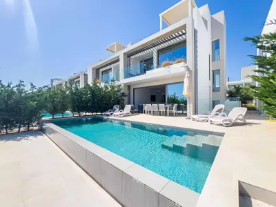 an image of a villa with a swimming pool at Azure Breeze Villa - Roof Garden & Sea Views in Protaras