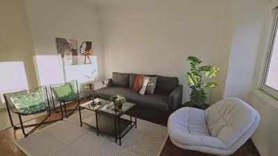a living room with a couch and two chairs at STAY City Life Apartment I in Nicosia