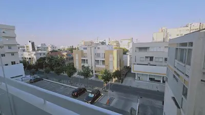 a view of a city with buildings and cars on the street at STAY City Life Apartment II in Nicosia