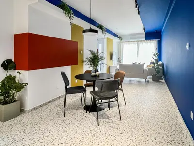 a dining room with a table and chairs at Terrazzo style 2 bedroom 2bathroom Apartment in Larnaka